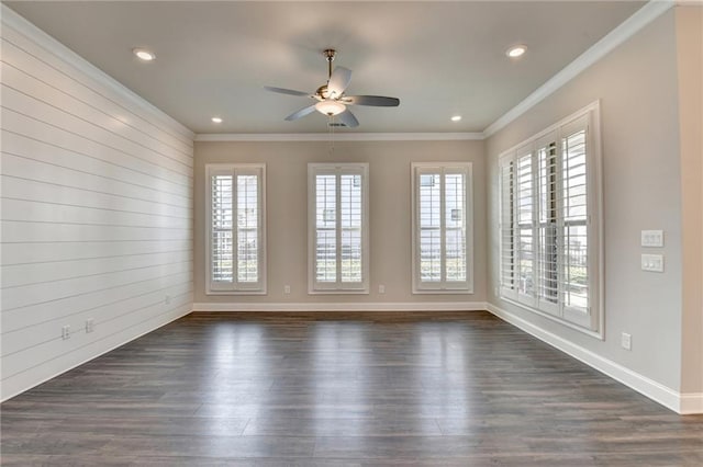 unfurnished room featuring dark wood-style flooring, recessed lighting, ornamental molding, ceiling fan, and baseboards