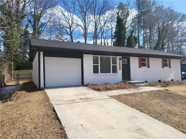 single story home featuring a garage