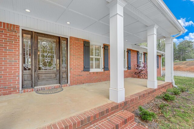 3464 Maynard Cir, Gainesville, GA 30506 - property entrance with a porch and brick siding