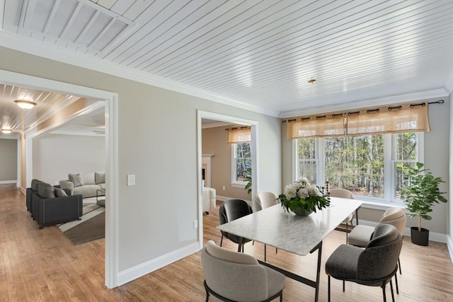 3464 Maynard Cir, Gainesville, GA 30506 - dining space with ornamental molding and light wood-style floors