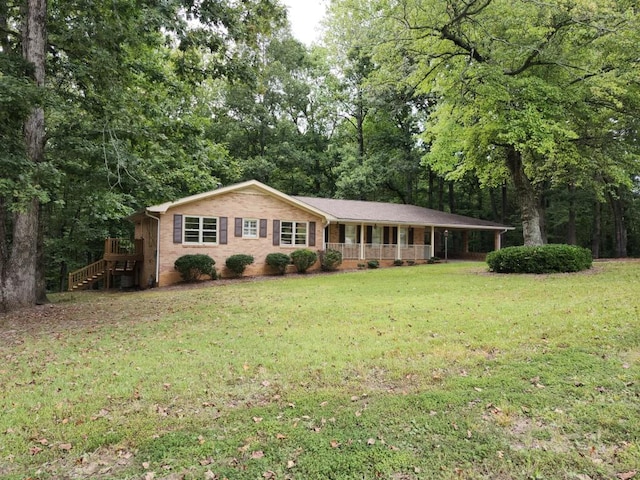 ranch-style house featuring a front lawn