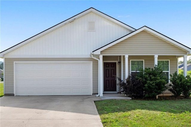 64 Middleton Ct, Chatsworth, GA 30705 - view of front of home featuring concrete driveway, a front yard, a garage, and a porch