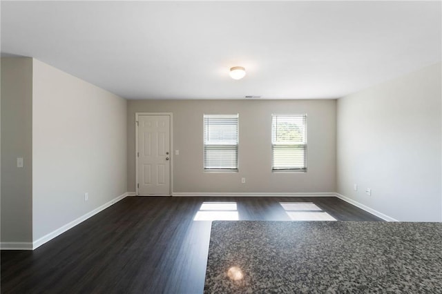 64 Middleton Ct, Chatsworth, GA 30705 - empty room featuring dark wood-style flooring and baseboards