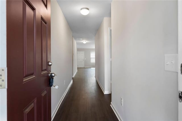 64 Middleton Ct, Chatsworth, GA 30705 - hallway with dark wood-style floors and baseboards