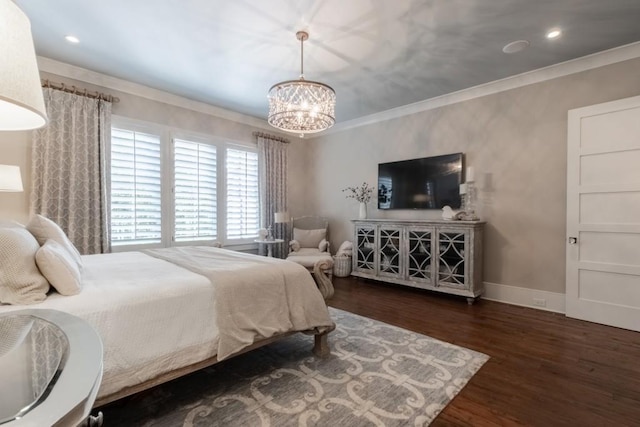 bedroom featuring a notable chandelier, dark hardwood / wood-style floors, and ornamental molding