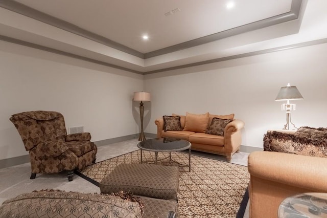 living room with a tray ceiling