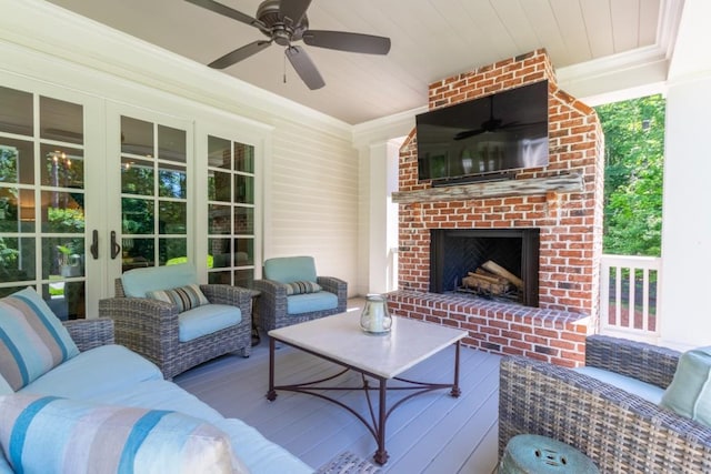 view of patio / terrace featuring french doors, an outdoor brick fireplace, and ceiling fan