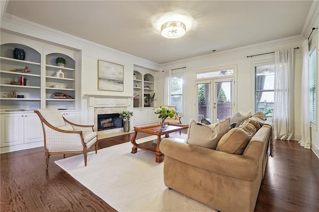 715 Saybeck Way, Milton, GA 30004 - living area with crown molding, a premium fireplace, dark wood-type flooring, built in features, and french doors