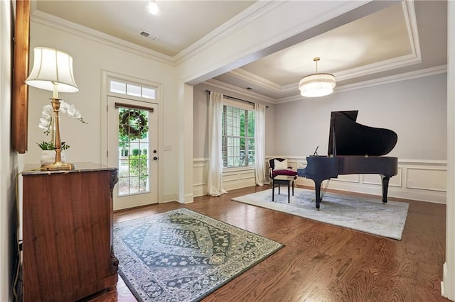 715 Saybeck Way, Milton, GA 30004 - entrance foyer featuring dark wood finished floors, ornamental molding, a decorative wall, and a wainscoted wall