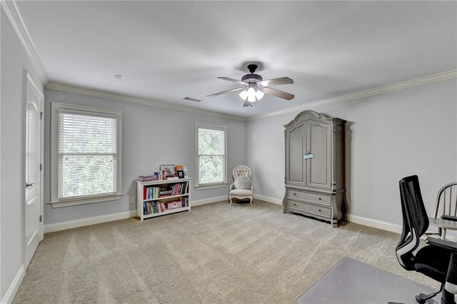 office space with light carpet, ceiling fan, and ornamental molding