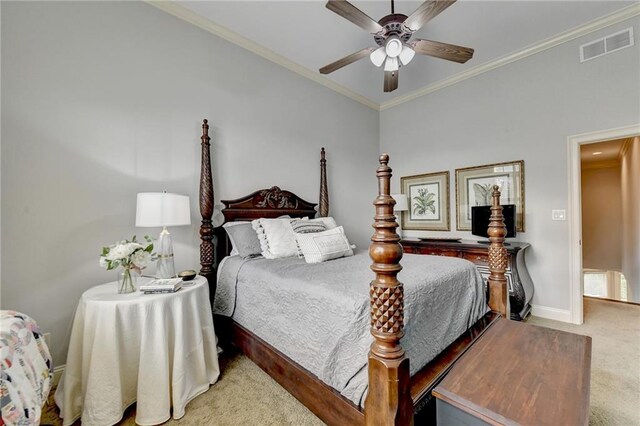 bedroom featuring carpet flooring, ceiling fan, and crown molding