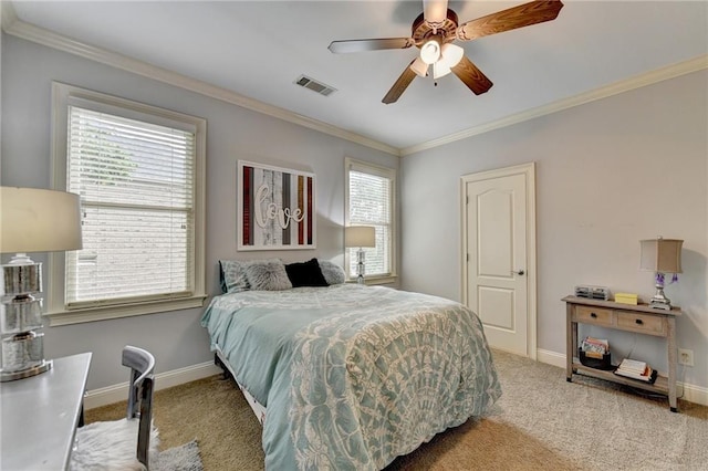 bedroom with carpet floors, ceiling fan, and ornamental molding