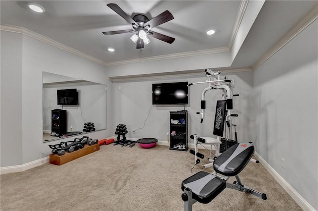 workout room featuring carpet flooring, ceiling fan, and crown molding