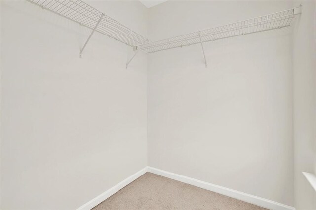 bathroom with shower / bath combination, visible vents, vanity, and toilet