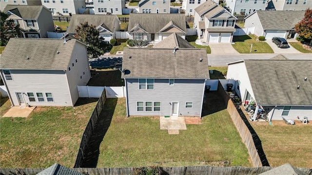 view of yard featuring a patio area and a fenced backyard