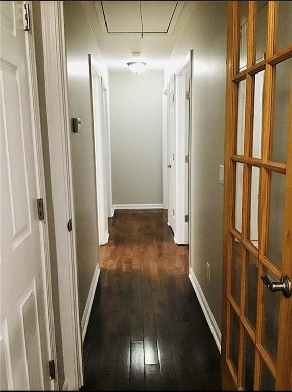 3535 Cameron Cir, Gainesville, GA 30506 - hall with attic access, dark wood-type flooring, and baseboards