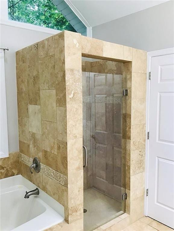 3535 Cameron Cir, Gainesville, GA 30506 - full bathroom featuring a stall shower, a garden tub, vaulted ceiling, and tile patterned floors