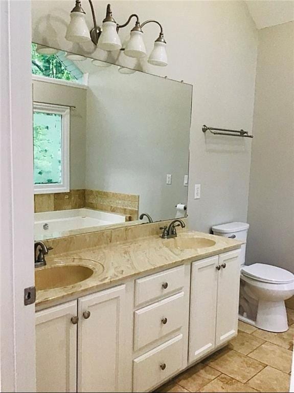 3535 Cameron Cir, Gainesville, GA 30506 - full bath with double vanity, toilet, and a bath