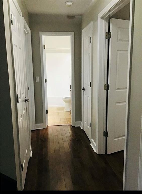 3535 Cameron Cir, Gainesville, GA 30506 - hall with dark wood-style floors and baseboards
