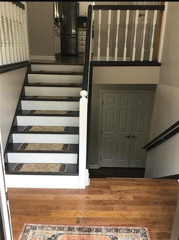 3535 Cameron Cir, Gainesville, GA 30506 - stairway with wood finished floors and baseboards