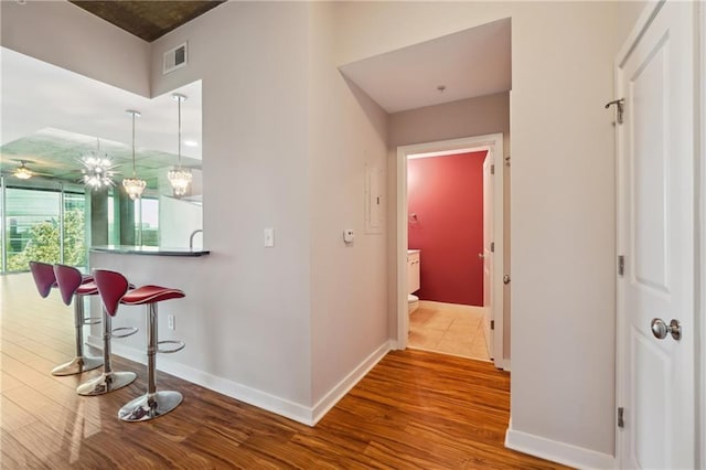 hallway featuring wood-type flooring