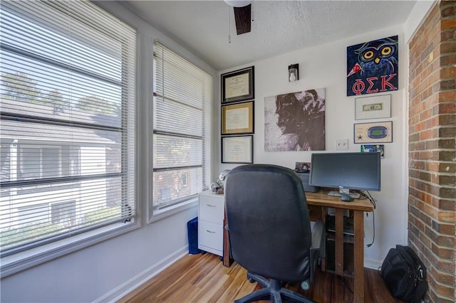 6700 Roswell Rd Unit 32C, Atlanta, GA 30328 - office with light wood-style floors, baseboards, a textured ceiling, and ceiling fan