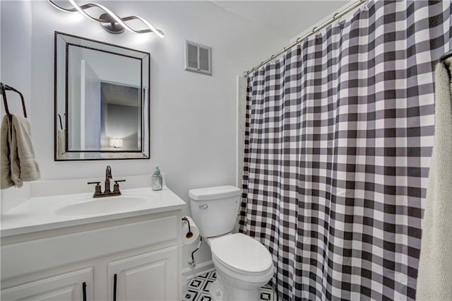 6700 Roswell Rd Unit 32C, Atlanta, GA 30328 - bathroom with toilet, vanity, and a shower with curtain