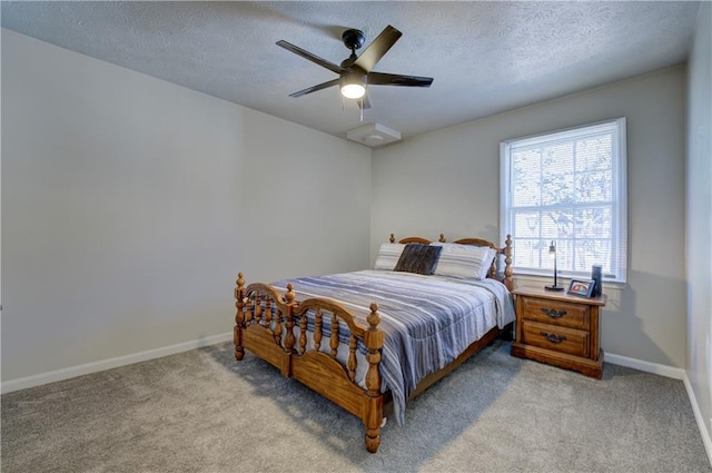 6700 Roswell Rd Unit 32C, Atlanta, GA 30328 - bedroom with light colored carpet, a textured ceiling, baseboards, and a ceiling fan