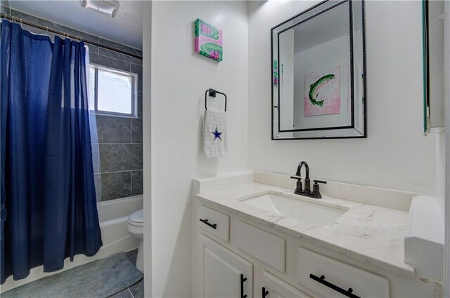 6700 Roswell Rd Unit 32C, Atlanta, GA 30328 - bathroom with toilet, vanity, shower / bathtub combination with curtain, and tile patterned flooring