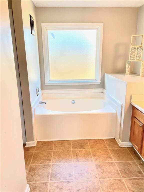 bathroom featuring a bathtub and vanity