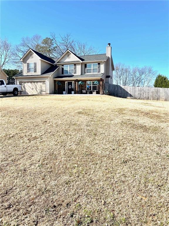 view of front of property with a garage