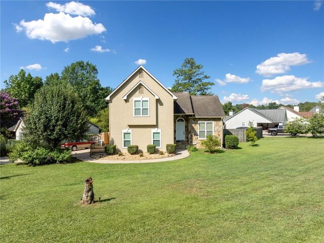 back of house featuring a yard