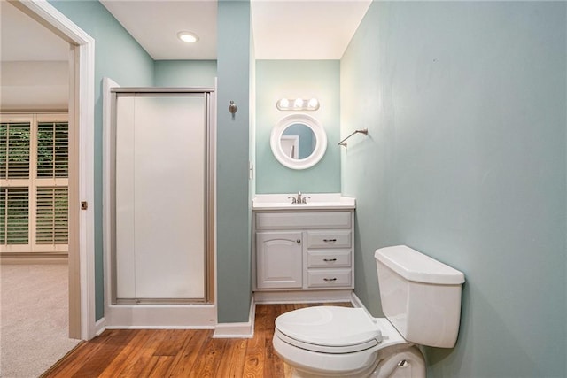 1488 White Columns Blvd, Canton, GA 30115 - bathroom with a shower stall, vanity, and wood finished floors