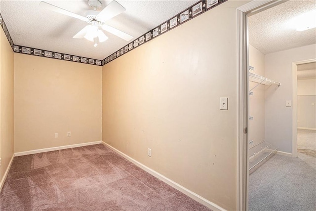 1488 White Columns Blvd, Canton, GA 30115 - carpeted spare room with a textured ceiling and ceiling fan