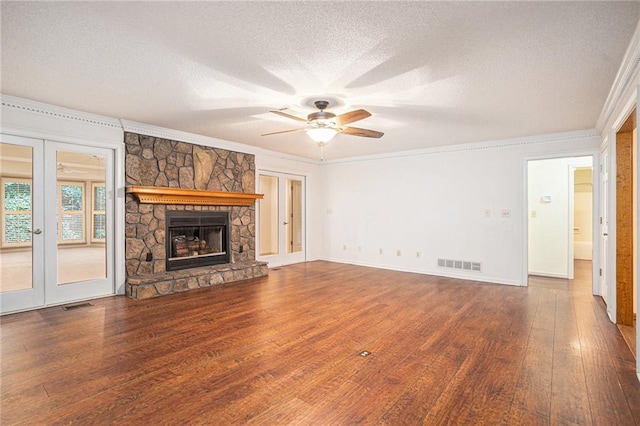 1488 White Columns Blvd, Canton, GA 30115 - unfurnished living room with hardwood / wood-style flooring, crown molding, a textured ceiling, french doors, and a ceiling fan