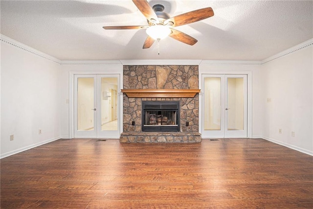 1488 White Columns Blvd, Canton, GA 30115 - unfurnished living room with french doors, wood finished floors, a textured ceiling, crown molding, and a ceiling fan