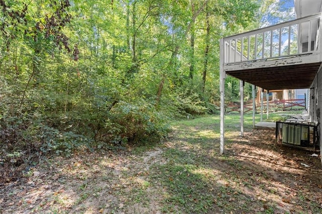 view of yard featuring a deck