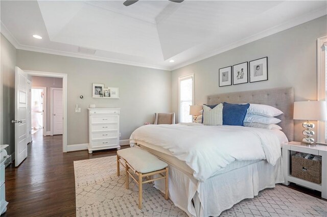 bedroom featuring baseboards, ornamental molding, recessed lighting, and wood finished floors