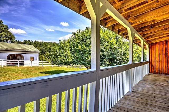 deck featuring an outdoor structure and an exterior structure