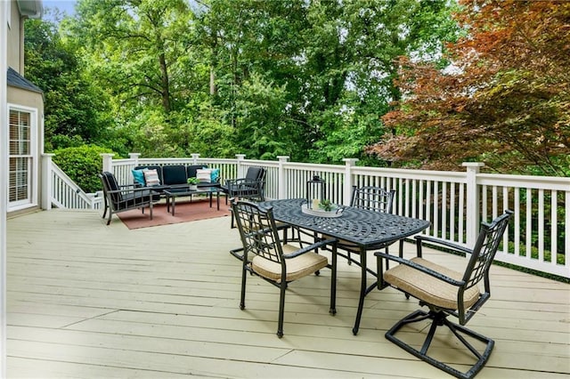 910 Kings Arms Way, Johns Creek, GA 30022 - wooden deck with an outdoor hangout area, outdoor dining area, and view of scattered trees