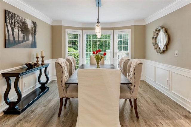 910 Kings Arms Way, Johns Creek, GA 30022 - dining area featuring wood finished floors, crown molding, wainscoting, and a decorative wall