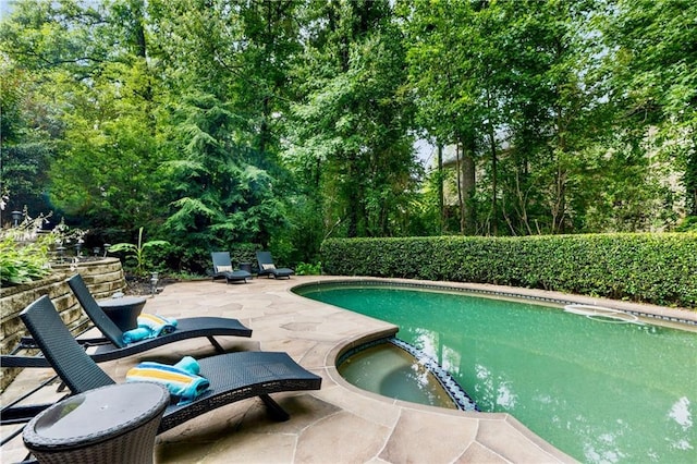 910 Kings Arms Way, Johns Creek, GA 30022 - view of pool with a patio area and a pool with connected hot tub