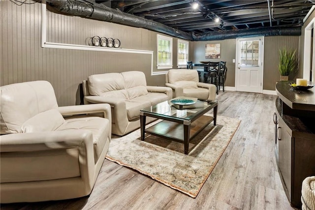 910 Kings Arms Way, Johns Creek, GA 30022 - living room featuring wood finished floors and wooden walls