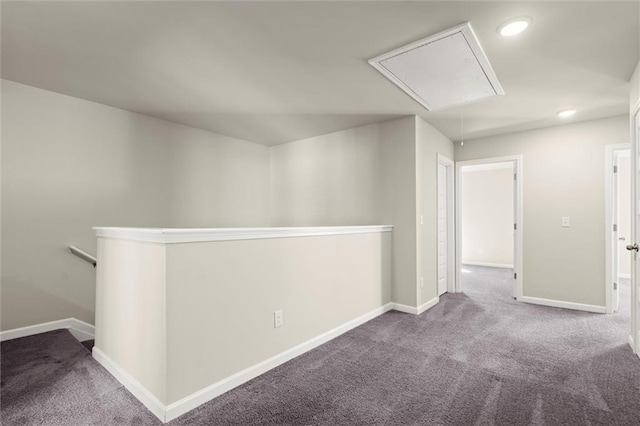 corridor with carpet, recessed lighting, attic access, an upstairs landing, and baseboards