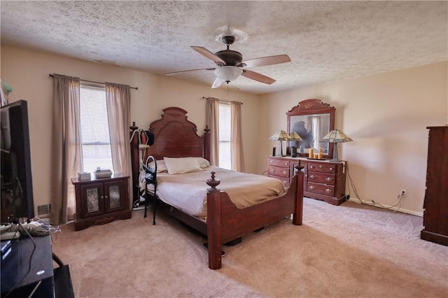744 Hampton Locust Grove Rd, Hampton, GA 30228 - carpeted bedroom with ceiling fan, multiple windows, and a textured ceiling