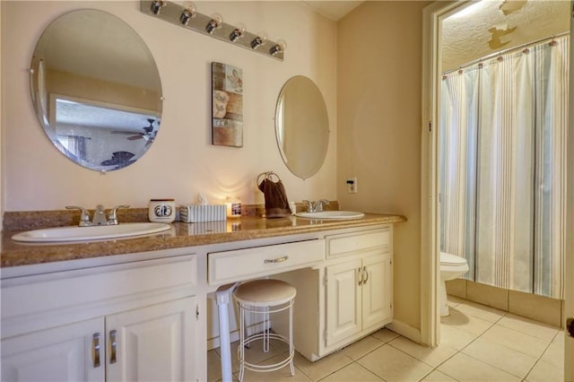 744 Hampton Locust Grove Rd, Hampton, GA 30228 - bathroom with tile patterned flooring, vanity, and toilet