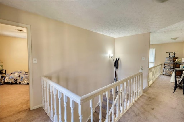 744 Hampton Locust Grove Rd, Hampton, GA 30228 - hallway with a textured ceiling and light colored carpet