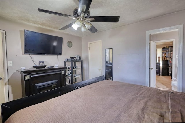 744 Hampton Locust Grove Rd, Hampton, GA 30228 - bedroom featuring a textured ceiling and ceiling fan