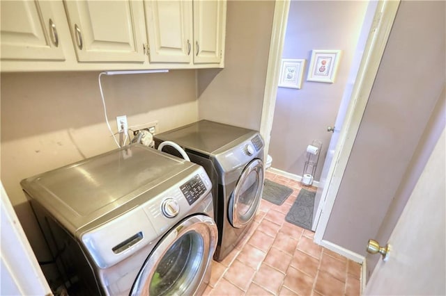 744 Hampton Locust Grove Rd, Hampton, GA 30228 - washroom with light tile patterned flooring, independent washer and dryer, and cabinets