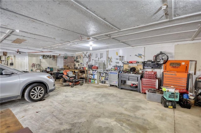 744 Hampton Locust Grove Rd, Hampton, GA 30228 - garage featuring a workshop area